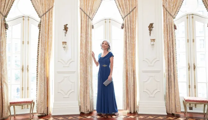 Petite Long Cowl Neck A-Line Matte Jersey Dress With Pleated Bodice Detail, Cowl Back, And Embellishment Detail